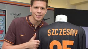 ROME, ITALY - JULY 29: AS Roma's new loan signing Wojciech Szczesny poses with his shirt on July 29, 2015 in Rome, Italy. (Photo by Luciano Rossi/AS Roma via Getty Images)