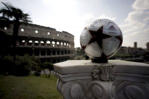 'Rome's Finale', the official match ball for the 2009 UEFA Champions League's final is displayed on March 16, 2009 in front of the Colosseum in Rome. The final of the 2009 Champions League will take place at Stadio Olimpico in Rome on May 27. AFP PHOTO / FILIPPO MONTEFORTE