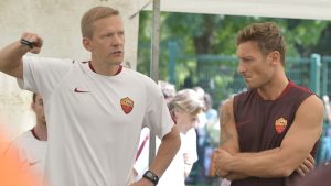 TRENTO, ITALY - JULY 10: Francesco Totti of AS Roma and AS Roma Director of performance Darcy Norman during an AS Roma training session on July 10, 2015 in Pinzolo near Trento, Italy. (Photo by Luciano Rossi/AS Roma via Getty Images)