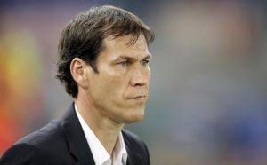 AS Roma coach Rudi Garcia of France waits for the start of a Serie A soccer match between AS Roma and Chievo, at Rome's Olympic stadium, Thursday, Oct. 31, 2013. (AP Photo/Andrew Medichini)